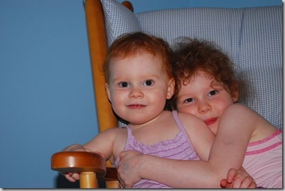 Sisters in a chair