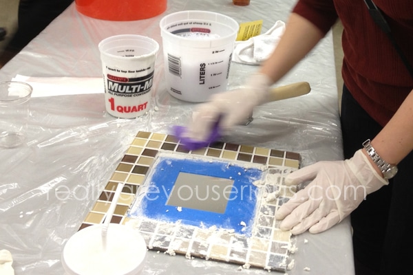 grout on the mirror and tile